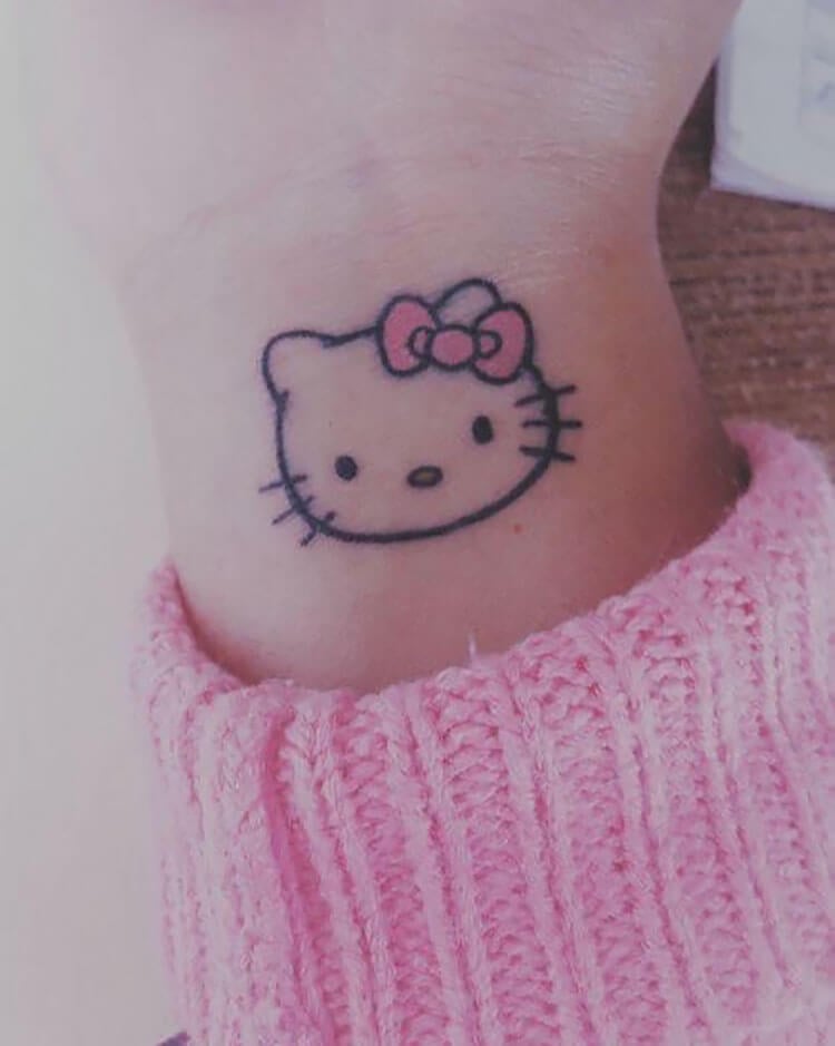 Girly Hello Kitty Wrist Tattoo