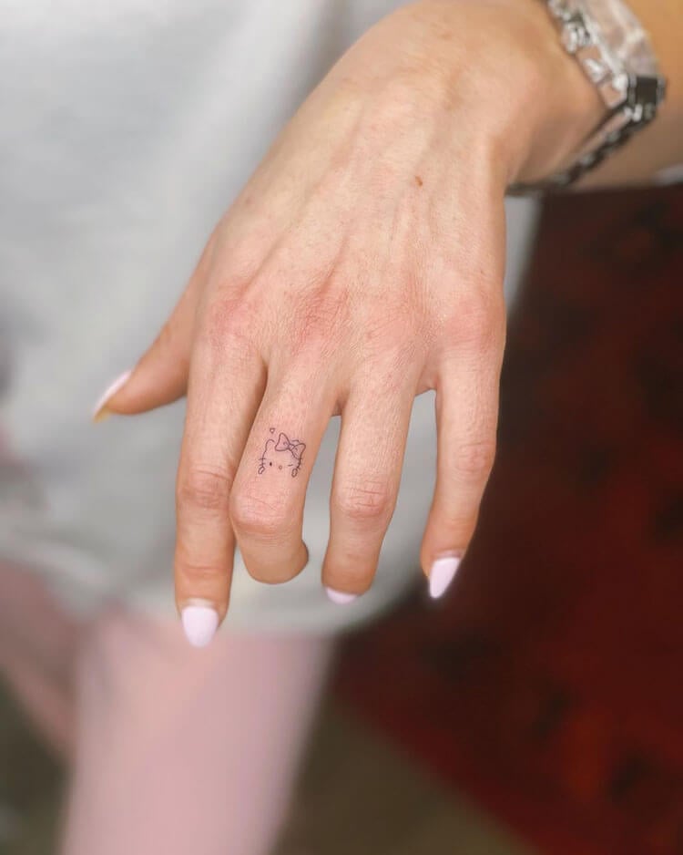 Hello Kitty Finger Tattoo