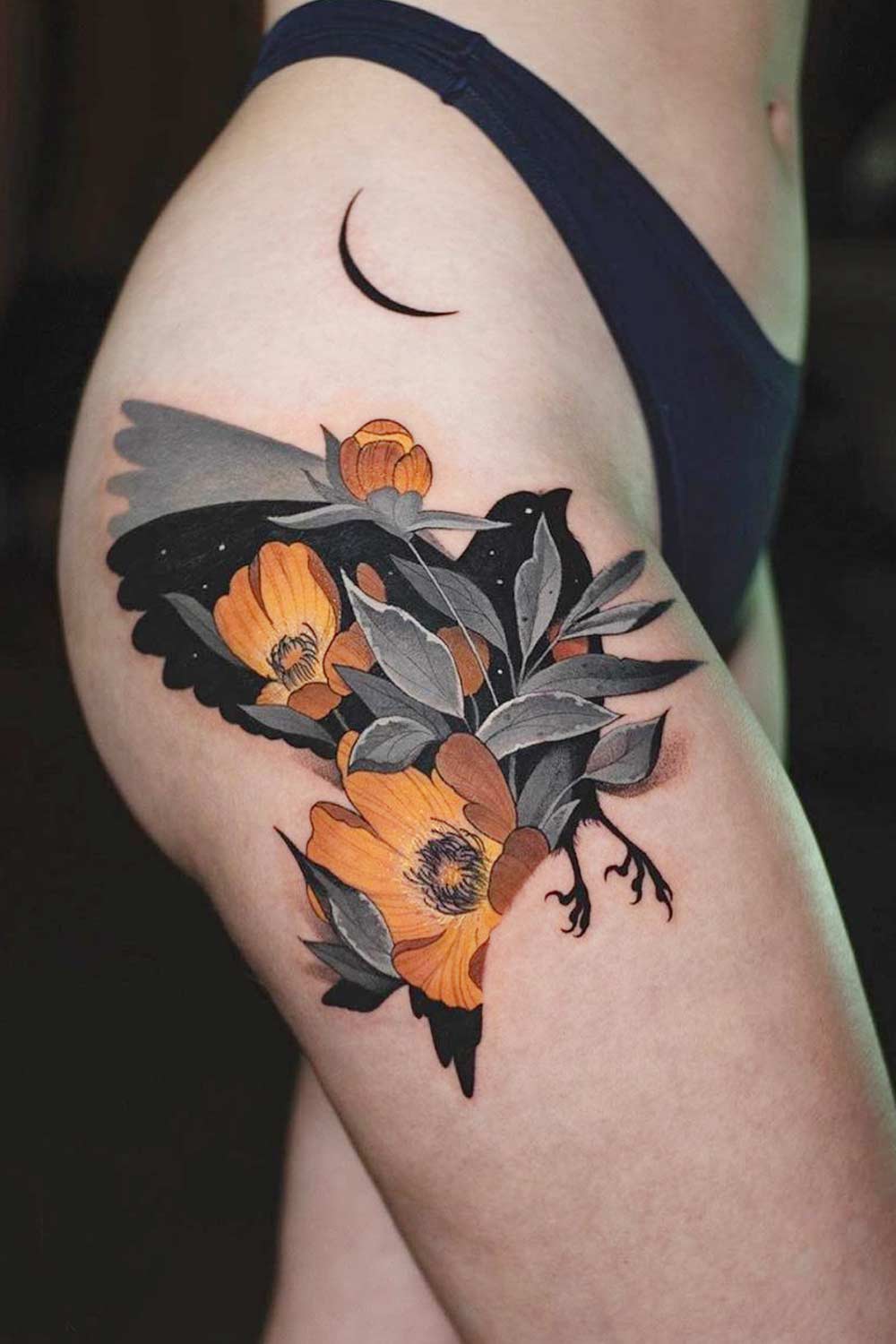 Bird with Flowers Thigh Tattoo