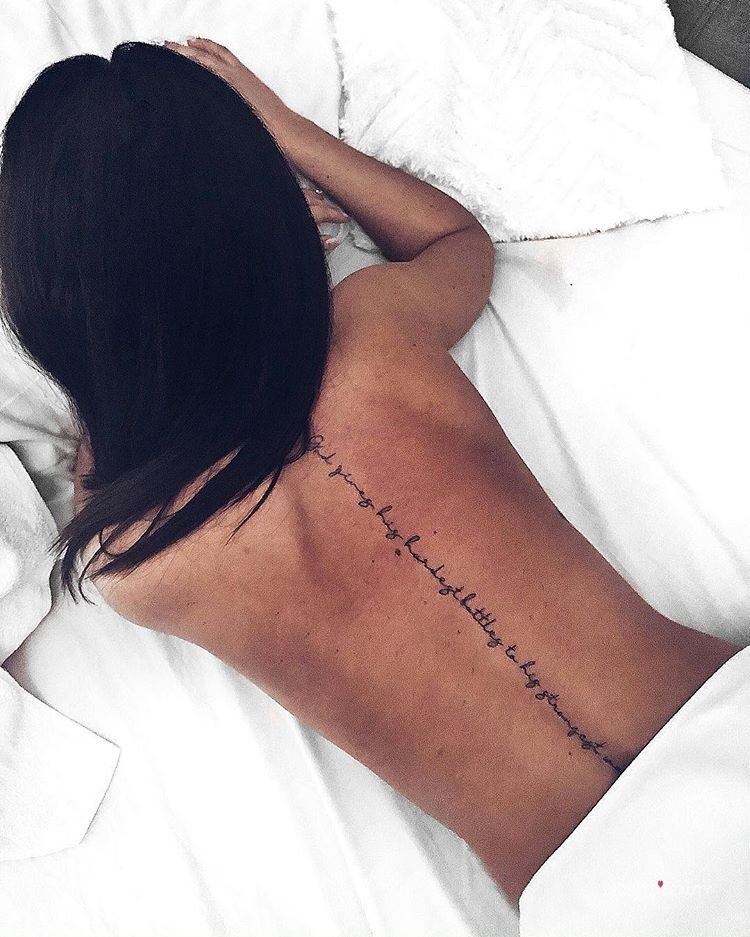 spine script tattoo