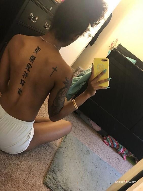 Meaningful Spine Tattoo