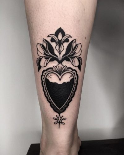 Discover Top 20 Black Heart Tattoo Designs for 2024: Symbolism &#038; Style in Ink