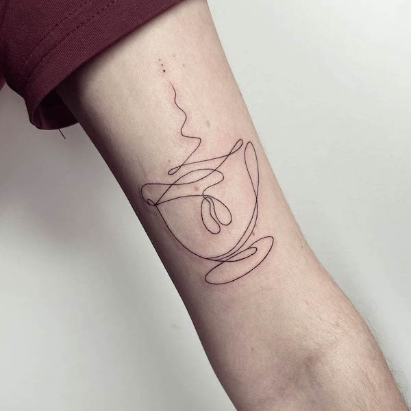 Abstract single line coffee tattoo by @kamilburta_ink