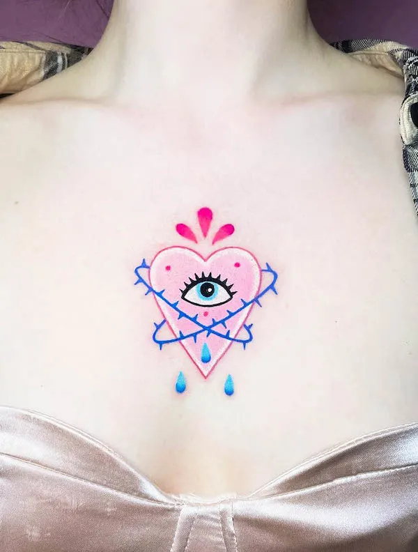 Crying heart middle chest tattoo by @glossy_future