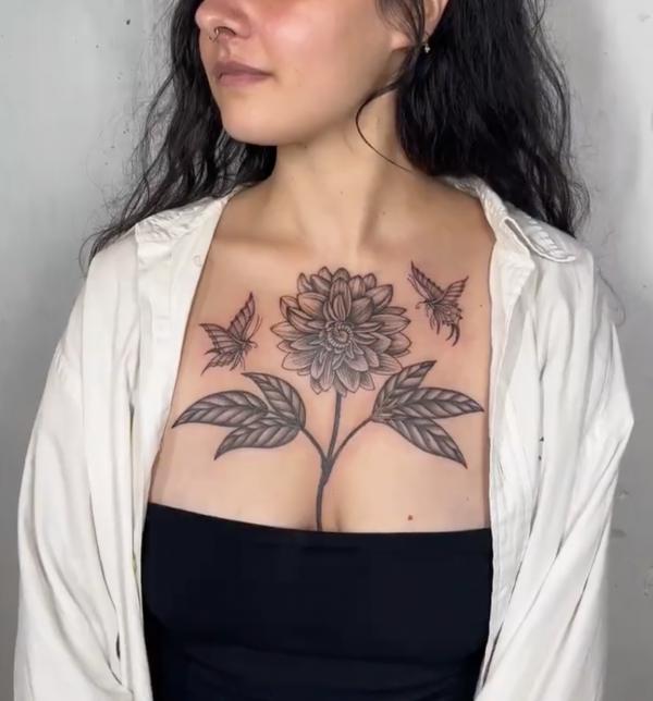 Dahlia and butterfly chest tattoo