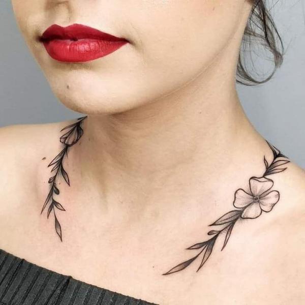 Leaves and flower necklace tattoo