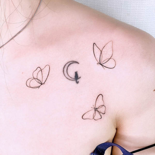 Minimalist butterflies on the chest by @zitae_tattooer