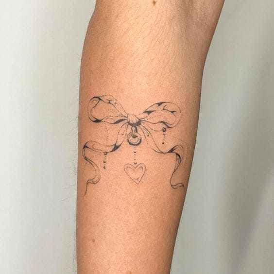 Ribbon Bow Tattoos On Arm 3