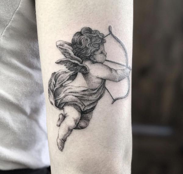 Small cupid tattoo dotwork