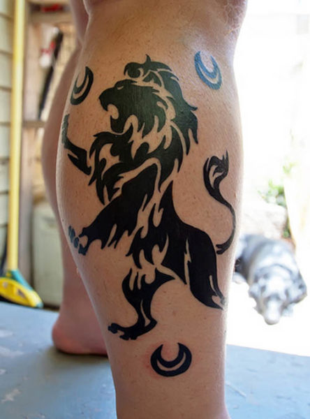 Lion Tattoo Tribal Design on Leg