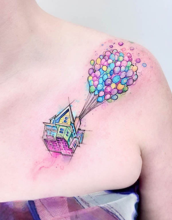 Up watercolor chest and shoulder tattoo by @adrianbascur