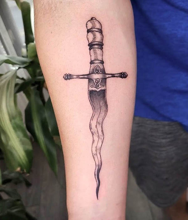 Wavy dagger tattoo by @studiobadvibrations