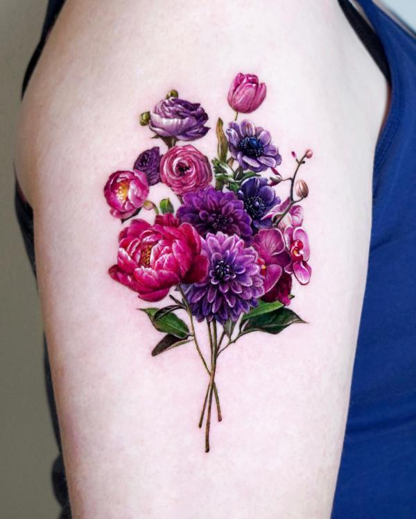 A bouquet of dahlia rose daisy orchid tattoo