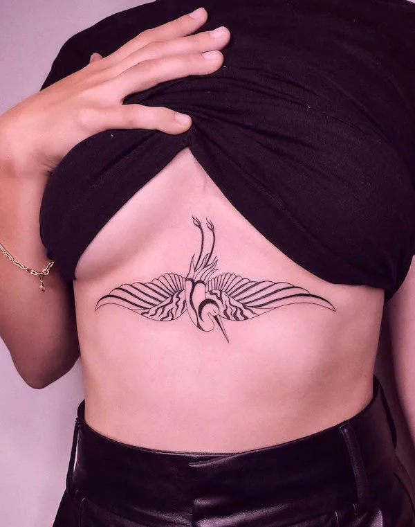 Bird sternum tattoo by @saskiapatrice