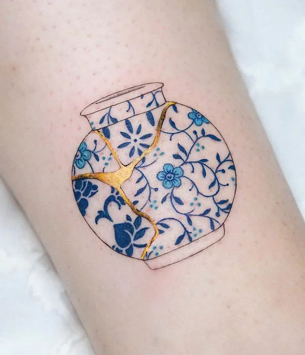 Kintsugi vase tattoo by @adelaide.tattooing