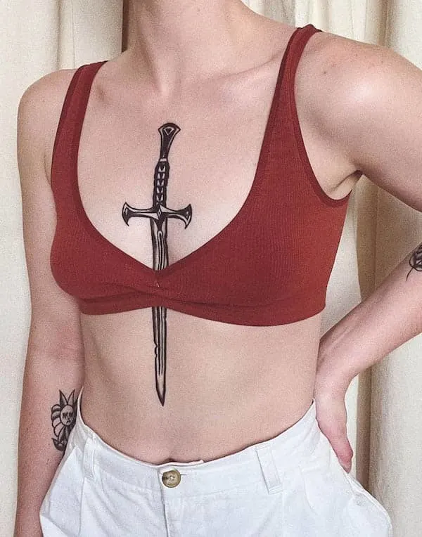 Sword  upper body tattoo by @thrifty.jules