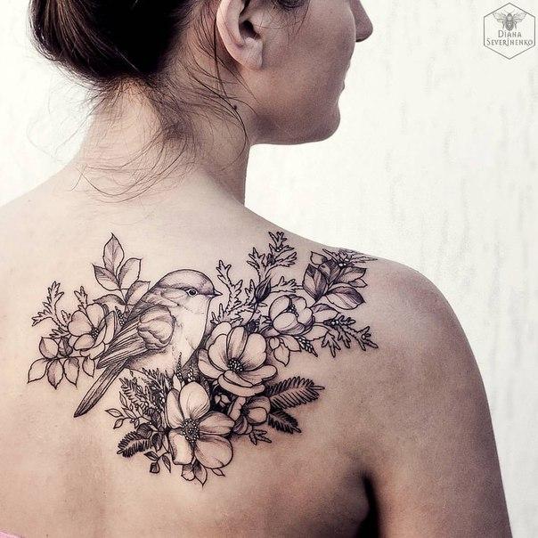 bird and flower back tattoo