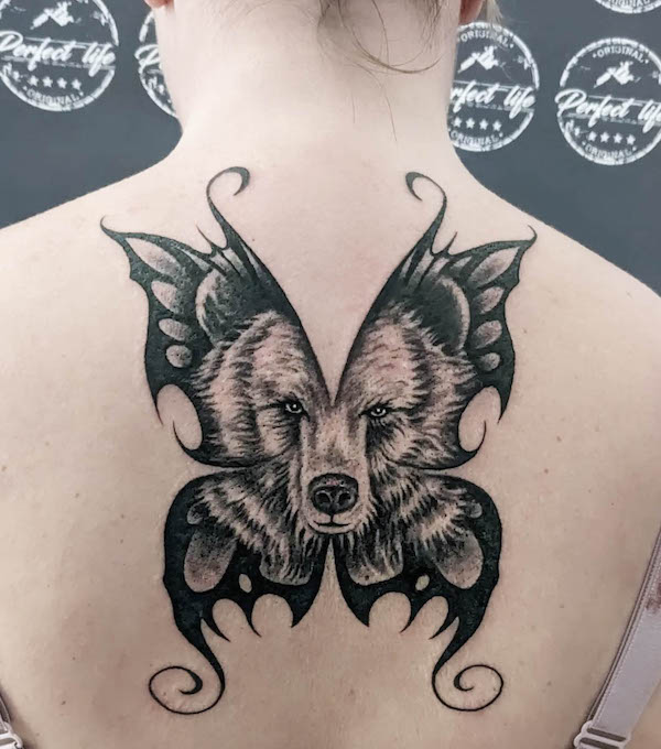 Bear butterfly back tattoo by @perfectlifetattoogalerie