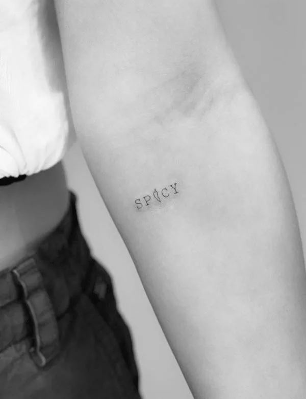 Small forearm word tattoo for women by @nanatzahor