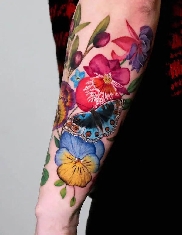 Stunning flower full forearm tattoo by @myszata_tattoo