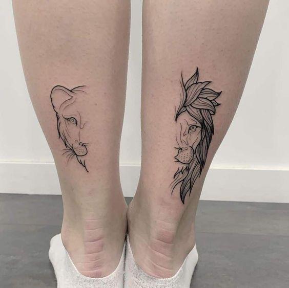 Lion and lioness tattooed on the calf