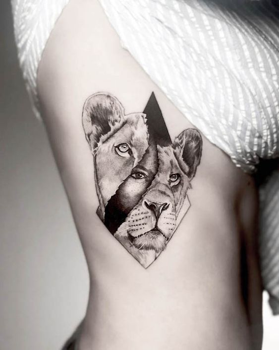 Illustrative style lioness tattoo on the ribs