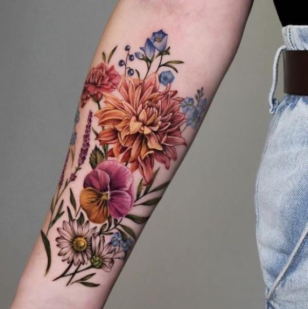 Dahlia orchid and daisy tattoo