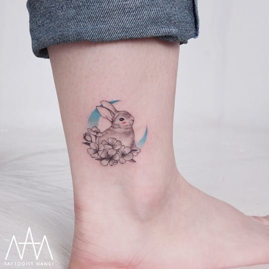 Rabbit, Flowers and Blue Crescent Moon on Ankle by Tattooist Nanci