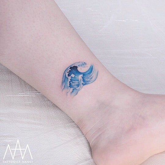 Blue Ink Wave Tattoo by Tattooist Nanci