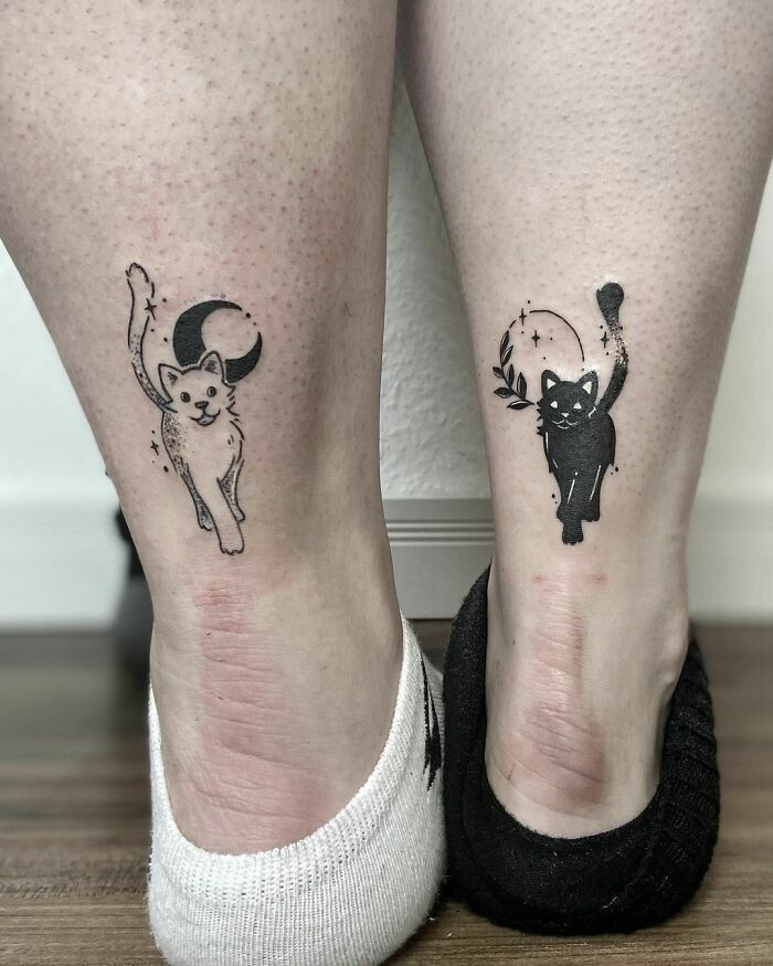 This may contain: two tattoos on the legs of people with cat and moon tattoo designs on their feet